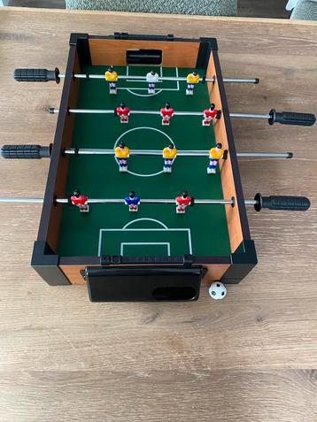 Mini tafelvoetbal spel 30 x 50 cm beschikbaar voor biedingen