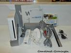 Nintendo Wii Wii Sports Pack (Compleet, Wit), Spelcomputers en Games, Spelcomputers | Nintendo Wii, Ophalen of Verzenden, Gebruikt