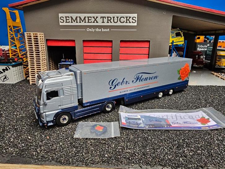 Wsi man tgx xxl 4x2 gebr fleuren bloemenauto, Hobby en Vrije tijd, Modelauto's | 1:50, Zo goed als nieuw, Bus of Vrachtwagen, Wsi
