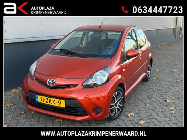 Toyota Aygo 1.0 VVT-i Comfort Orange Carplay Nieuwe apk Airc, Auto's, Toyota, Bedrijf, Te koop, Aygo, ABS, Airbags, Airconditioning