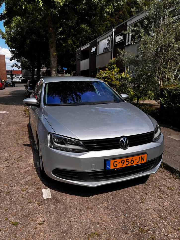 Volkswagen Jetta MK6 2015 metalic grijs, Auto's, Volkswagen, Particulier, Jetta, Airbags, Airconditioning, Apple Carplay, Bluetooth