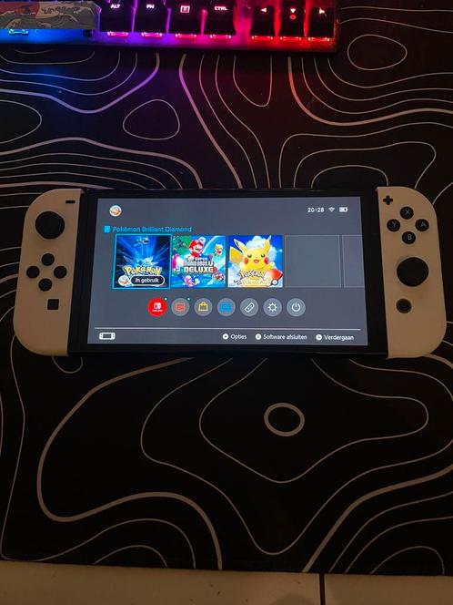 Nintendo switch OLED Met bon, Spelcomputers en Games, Games | Nintendo Switch, Zo goed als nieuw, Overige genres, 2 spelers, Vanaf 3 jaar