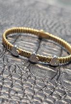 Prachtige 14karaat gouden armband flexibel met hartjes