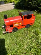 Oude blikken puff puff locomotief, Ophalen