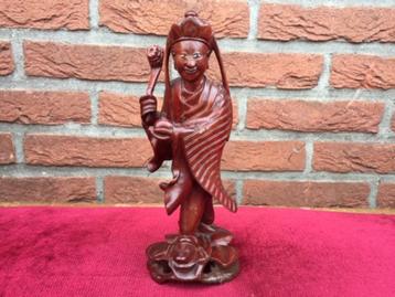 oud houten beeldje, godheid met scepter beschikbaar voor biedingen