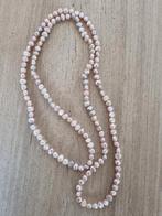 Roze zoetwater parelketting, Ophalen