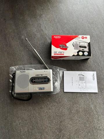  Draagbare zakradio noodradio 2x AA batterijen FM/AM Radio beschikbaar voor biedingen
