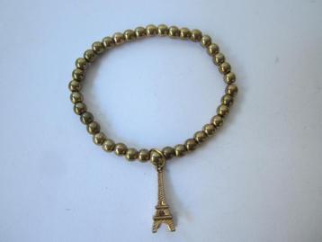 armband met goudkleurige kralen, beschikbaar voor biedingen