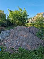 grond met puin., Ophalen