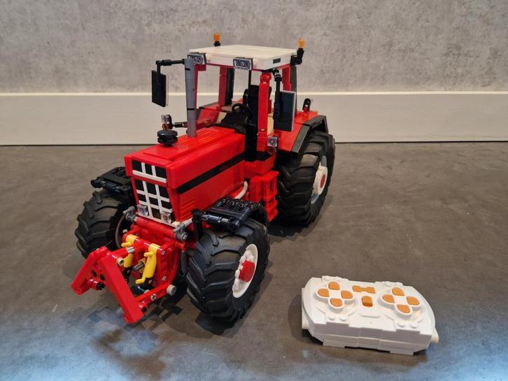 Case international volledig bestuurbaar, Kinderen en Baby's, Speelgoed | Speelgoedvoertuigen, Zo goed als nieuw, Afstandsbediening