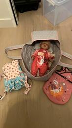 Baby born pop met reiswieg, slaapzak en buikdrager, Ophalen, Zo goed als nieuw