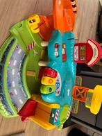 Toettoet baan / stoplicht / 2 auto’s, Kinderen en Baby's, Speelgoed | Vtech, Ophalen of Verzenden, Zo goed als nieuw