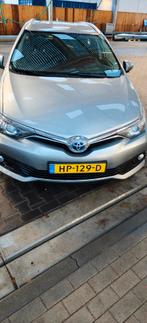 Toyota Auris 1.8 Hybrid Touring Sports CVT 2015 Grijs, Auto's, 65 €/maand, Stof, Euro 6, Adaptive Cruise Control