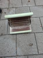 Antieke straalkachel, Ophalen