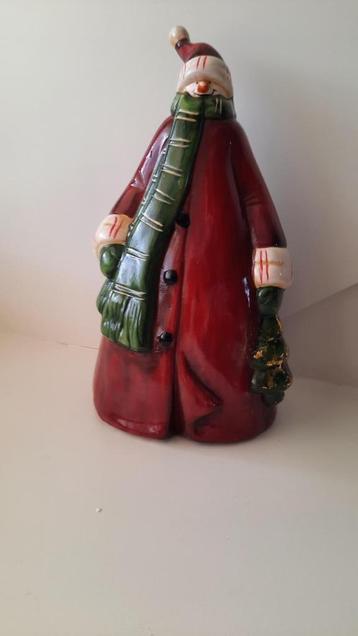 kerst pop gemaakt van aardewerk beschikbaar voor biedingen