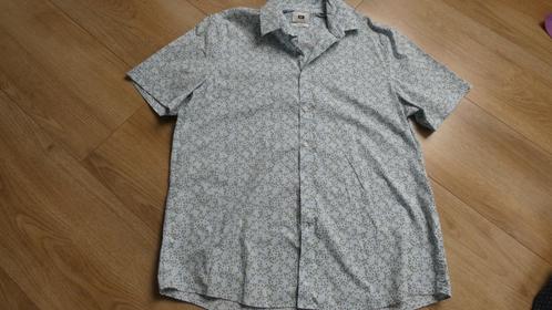 Lichtblauwe blouse korte mouw van de WE, Kleding | Heren, Overhemden, Zo goed als nieuw, Overige halswijdtes, Blauw, Ophalen of Verzenden