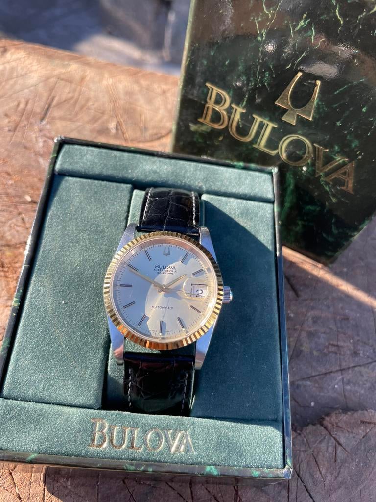 Bulova Super Seville datejust automatic, Sieraden, Tassen en Uiterlijk, Horloges | Heren, Overige merken, Verzenden, Goud, Leer