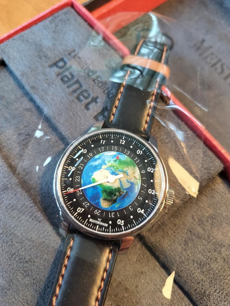 Meistersinger Planet Earth Horloge - Ongedragen!, Overige merken, Leer, Staal, Polshorloge