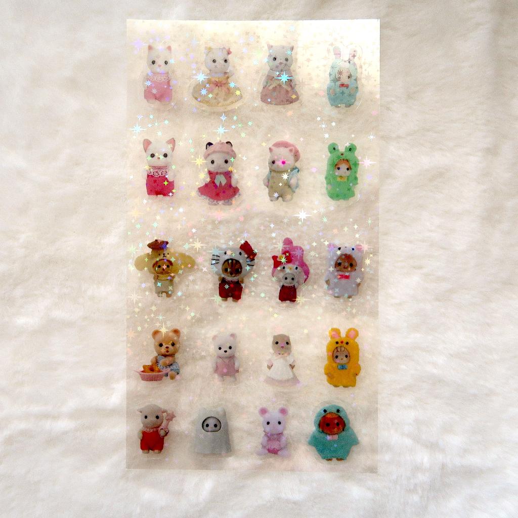 Sylvanian Family Stickervel met hologram ster afwerking, Verzamelen, Verzenden, Nieuw, Plaatje, Poster of Sticker