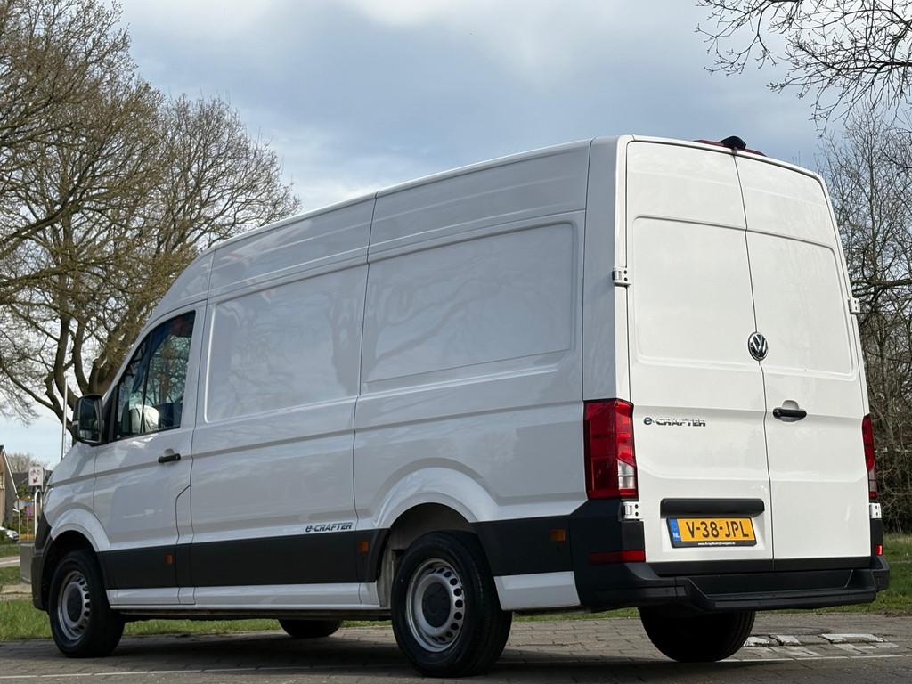 Volkswagen CRAFTER E-Crafter L2H3 36 kWh|100% elektrisch|cru, Auto's, Bestelauto's, Gebruikt, Zwart, Volkswagen, Wit