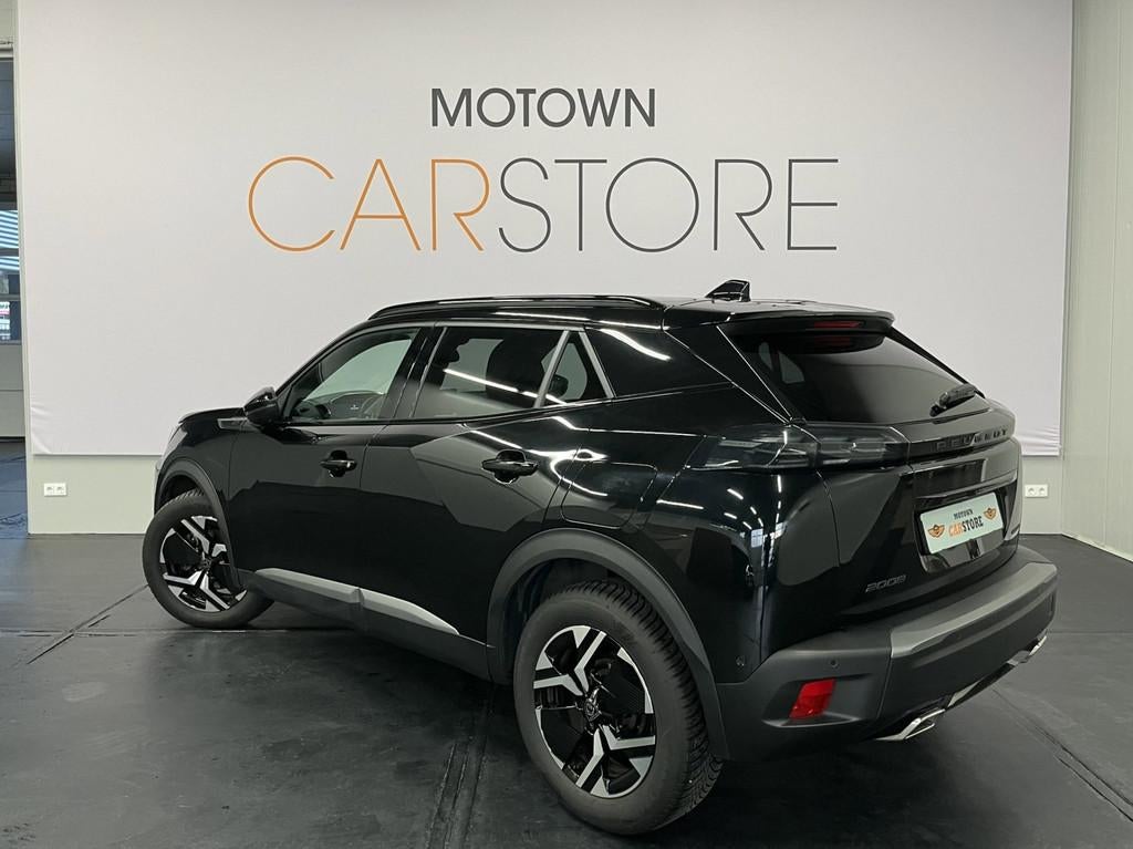 Peugeot 2008 1.2 Hybrid 145e GT Line 360 Camera Adapt. Cruis, Auto's, Peugeot, 145 pk, Zwart, 1199 cc, Leder en Stof