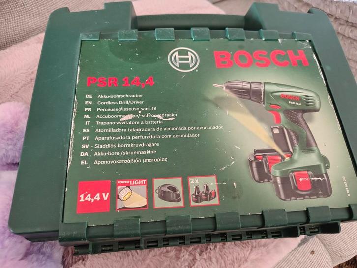 Bosch PSR 14,4 accuboormachine met koffer en lader, Doe-het-zelf en Verbouw, Gereedschap | Boormachines, Gebruikt, Boor- en Schroefmachine