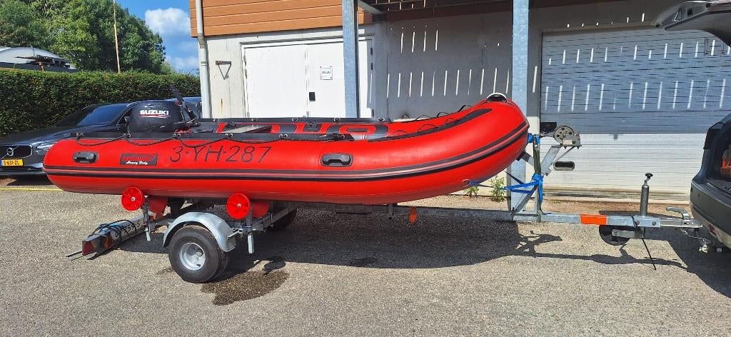 Rode rubberboot 3,9m met 8PK motor en trailer snelvaarend, Watersport en Boten, Rubberboten, Zo goed als nieuw, Benzine, Minder dan 70 pk