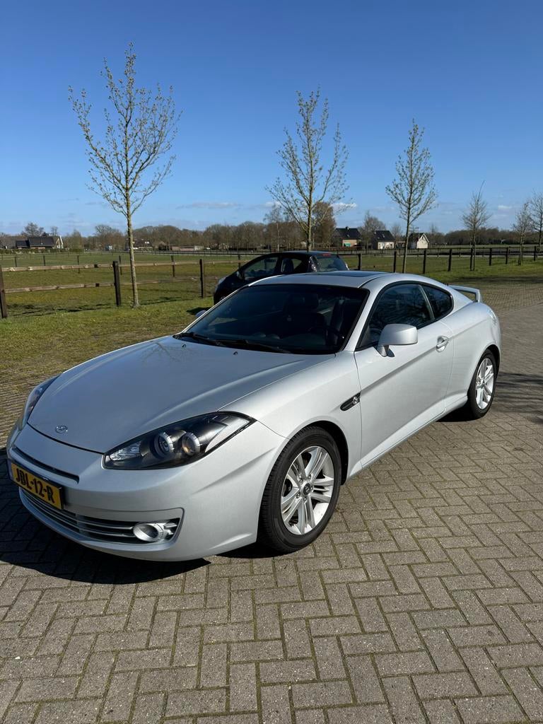 Hyundai Coupé (Tiburon) 2.0 2007 Grijs, Auto's, Hyundai, Particulier, Coupé, ABS, Airbags, Airconditioning, Alarm, Bluetooth, Centrale vergrendeling