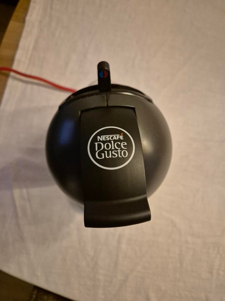 Koffiemachine Dolce Gusto Krups, Ophalen