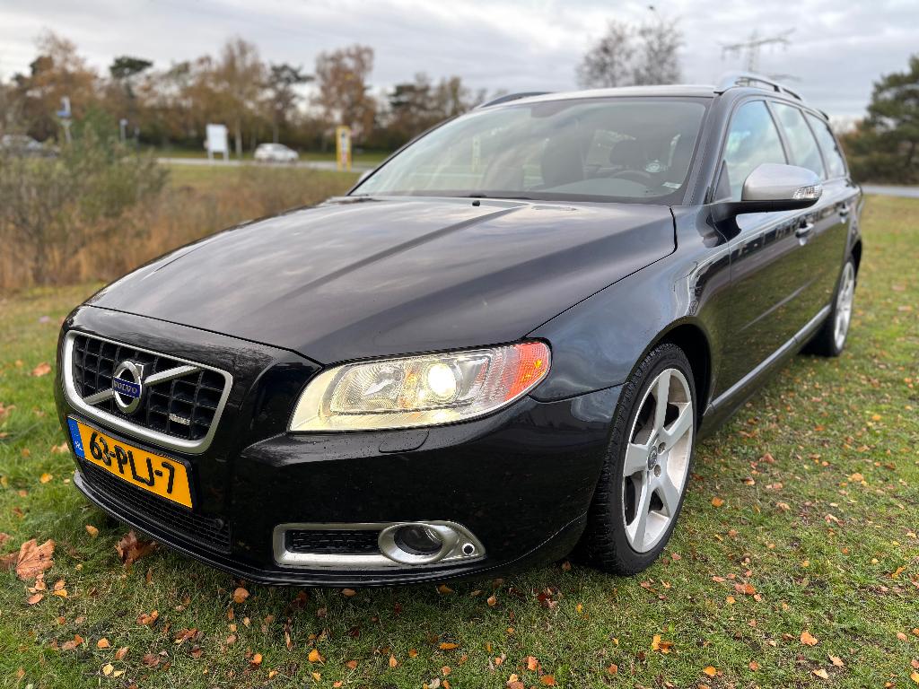 Volvo V70 2.0 T AUT 2011 Zwart, Auto's, Volvo, Euro 5, 4 cilinders, Zwart, 12 km/l