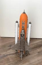 Space Shuttle van meccano  ., Ophalen