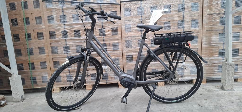 Multicycle Solo, elektrische damesfiets met middenmotor., Ophalen, Zo goed als nieuw, 50 km per accu of meer, 55 tot 59 cm