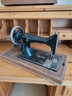 Oude naaimachine T.E.A.B., Ophalen