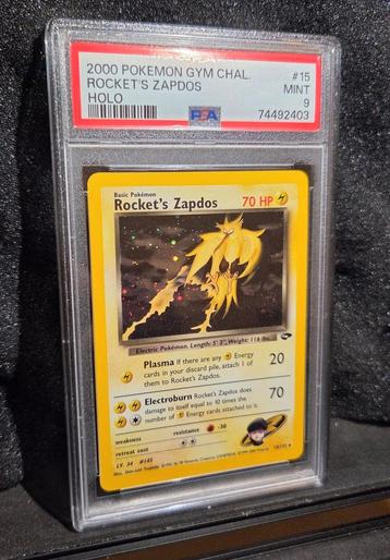PSA 9 - Rocket's Zapdos Holo #15 (2000 Gym Challenge) beschikbaar voor biedingen