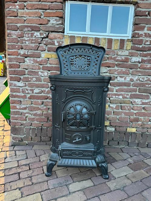 Authentieke gietijzeren Thermocet Dauphin gaskachel, Huis en Inrichting, Kachels, Zo goed als nieuw, Gaskachel, Gas, Ophalen