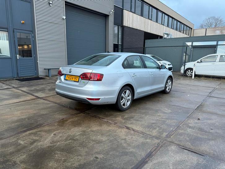 Volkswagen Jetta 1.4 TSI Hybrid 170pk 7-DSG 2013 Grijs, Auto's, Volkswagen, Bedrijf, Jetta, Hybride Elektrisch/Benzine, Volledig hybride