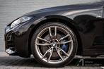 BMW 4-serie Coupé M440i xDrive High Executive schuifdak, ad, Auto's, Automaat, 12 maanden, 4 stoelen, Zwart