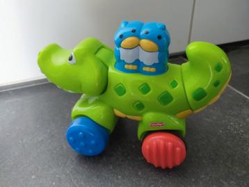 Leuke Fisher-Price press en go krokodil  beschikbaar voor biedingen