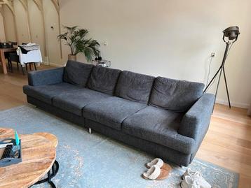 Grote 4 zits bank met hocker