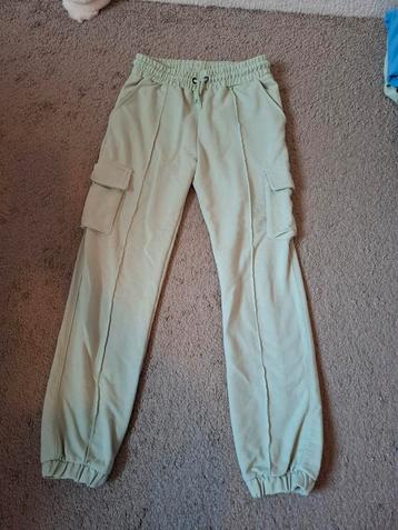 Mintgroene joggingbroek met zakken maat 158/164 beschikbaar voor biedingen