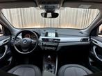 BMW X1 sDrive20i *192PK* Stoelverwarming / Navigatie / PDC /, 1998 cc, Stof, Zwart, Bedrijf