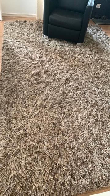 Hoogpolig tapijt,bruin met beige gemengd. 300cm bij 200cm beschikbaar voor biedingen