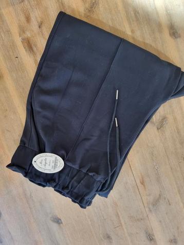 Blauwe Pantalon beschikbaar voor biedingen