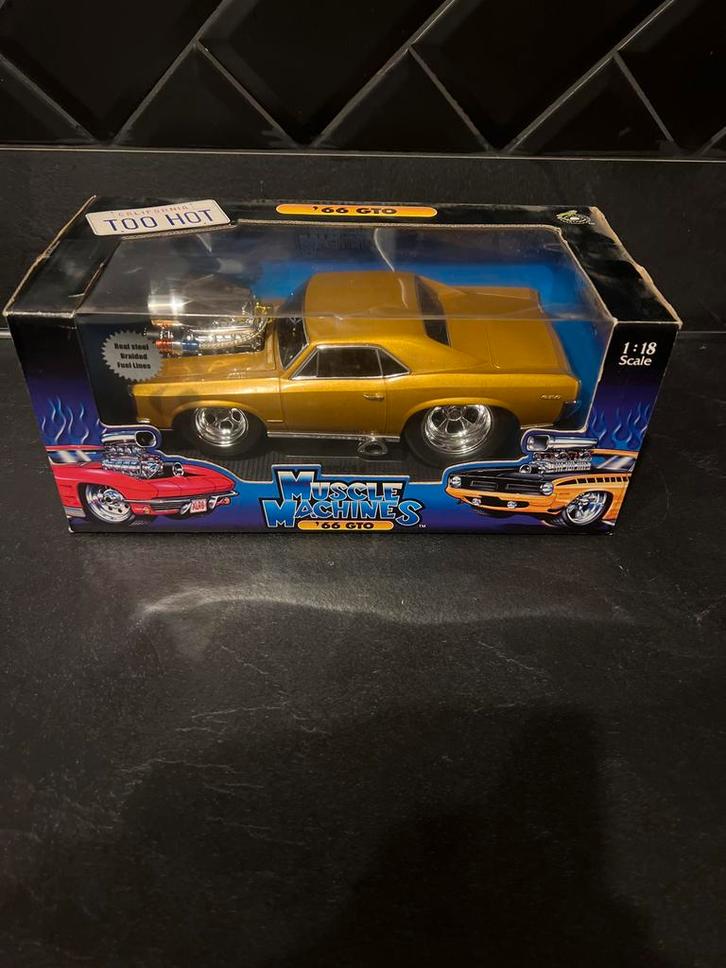 Muscle Machines Pontiac GTO 1966 1:18 Nieuw in Doos, Hobby en Vrije tijd, Modelauto's | 1:18, Nieuw, Auto, Overige merken, Ophalen of Verzenden