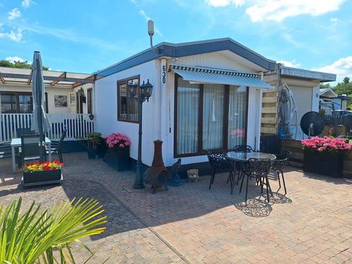 Chalet  aan de Maas, in Aalst  ( gemeente  Zaltbommel), Caravans en Kamperen, Stacaravans, Ophalen of Verzenden
