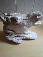 Betonnen paardenhoofd, Ophalen