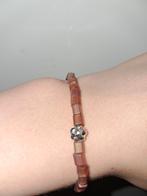 Paarsig armbandje met bloemetje, Sieraden, Tassen en Uiterlijk, Armbanden, Ophalen of Verzenden, Zo goed als nieuw, Paars, Met bedels of kralen