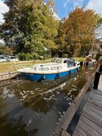 Een nette kajuitboot, Ophalen, Gebruikt, Staal, Diesel