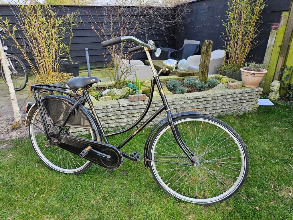 Zwarte damesfiets weduwe, Ophalen