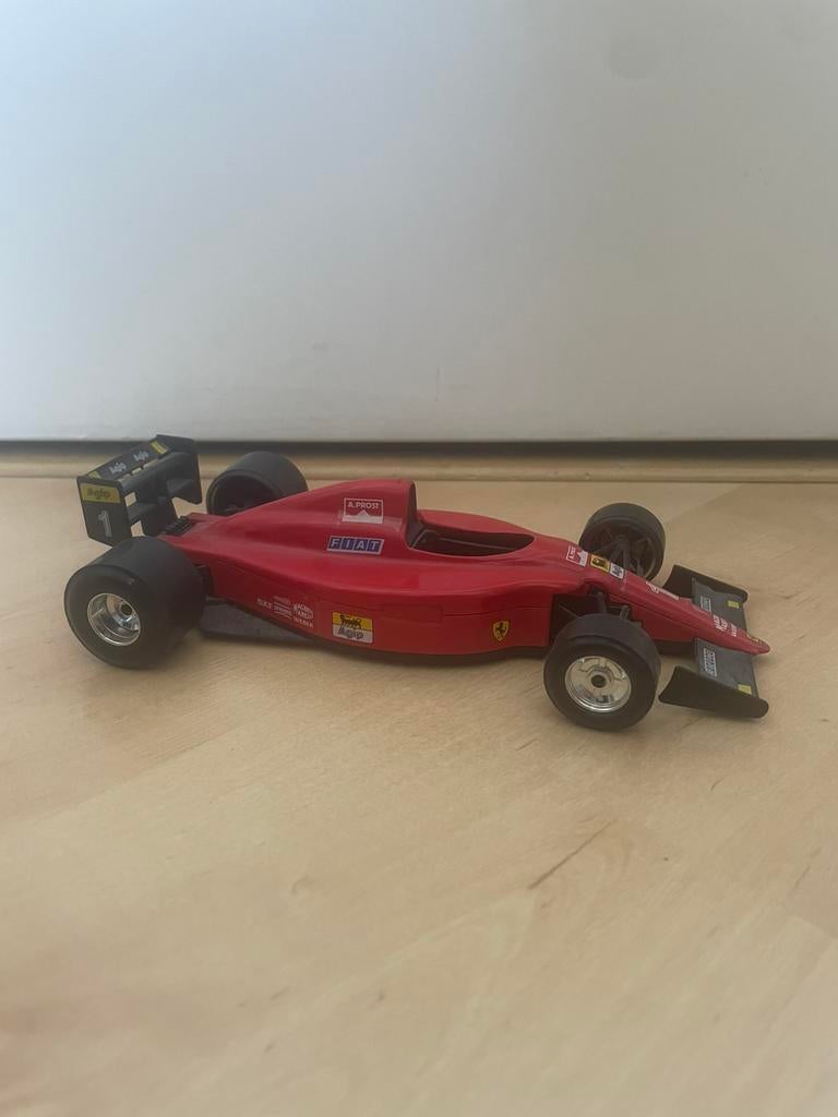 Bburago Ferrari 641/2 F1 Race auto 1:24, Ophalen of Verzenden, Zo goed als nieuw, Auto, Bburago